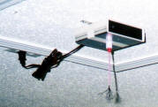 Model IG-133DGB ionizer mounted on ceiling (attic door). Mounting screws not supplied, since mounting requirements vary.